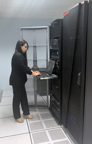 FCI employee at the console